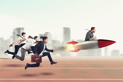 Businessman flying with rocket